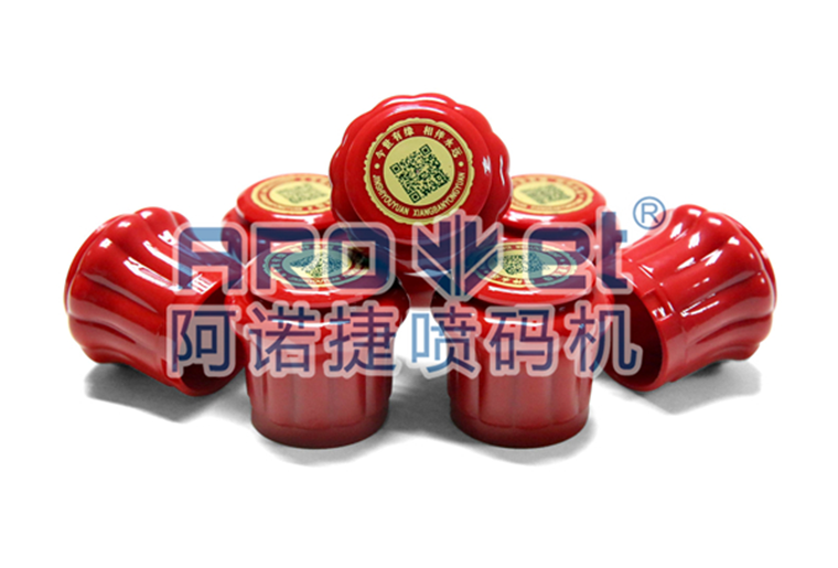 EVO视讯瓶盖喷码机在瓶盖上喷印二维码